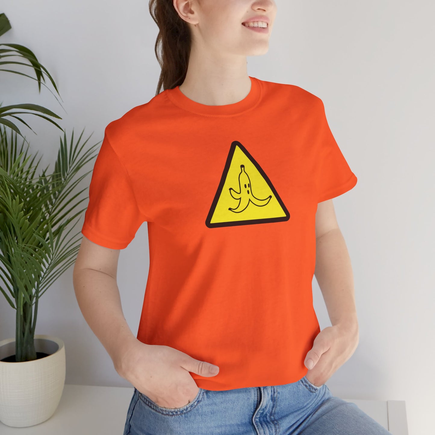 CAUTION BANANA. Unisex Jersey Short Sleeve Tee