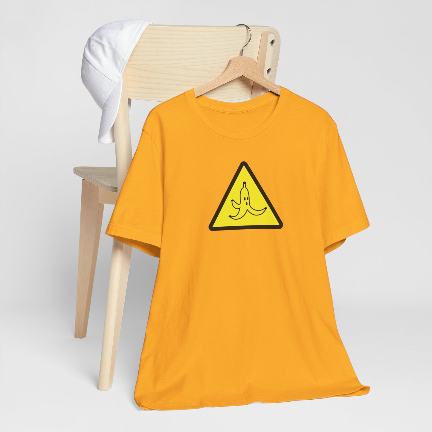 CAUTION BANANA. Unisex Jersey Short Sleeve Tee