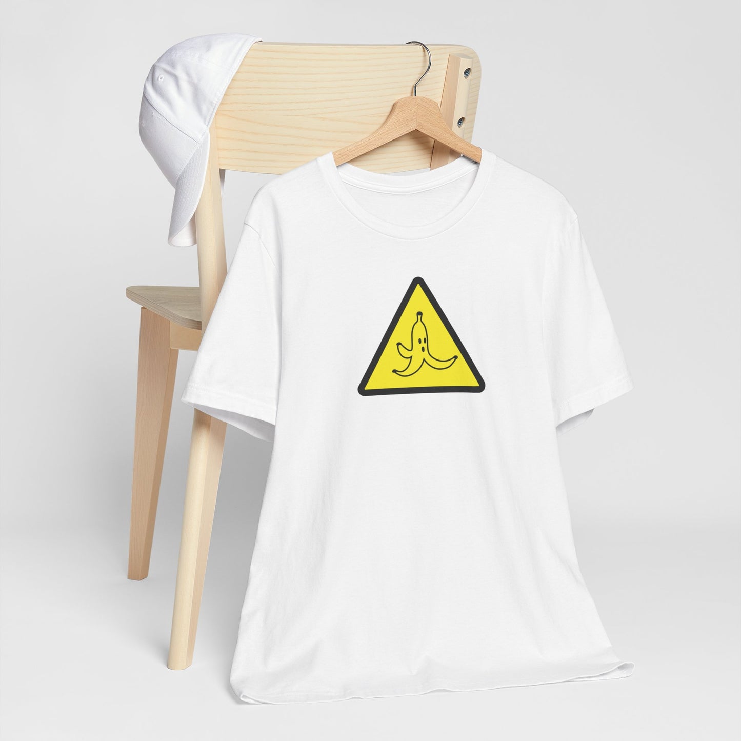 CAUTION BANANA. Unisex Jersey Short Sleeve Tee